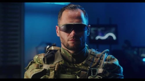 Soldier in Camo Military Uniform with Glasses Stares