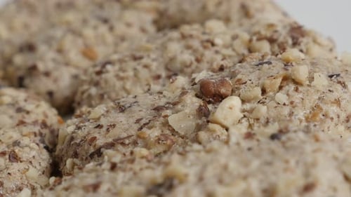 Pile of Delicious Cookies with Nuts Close Up