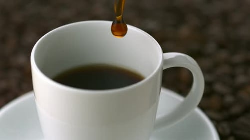 Coffee Being Poured Into a Mug, Close Up Shot