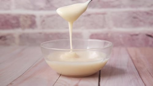 Condensed Milk in a Bowl Close Up