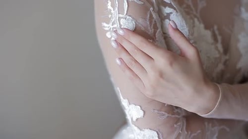 Close Up of Bride in Ornate Wedding Dress