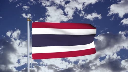Thai National Flag Waving in Blue Sky
