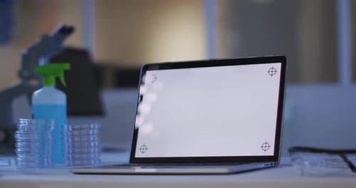 Laptop in a Science Laboratory with Blank Screen