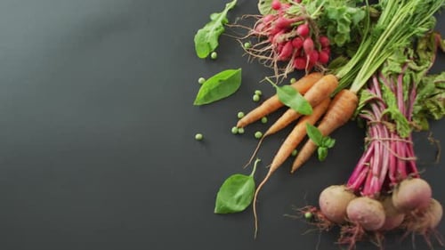 Video of fresh vegetables with copy space over grey background