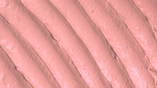 Abstract Pink Textured Background with Wavy Ridges