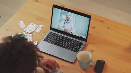 Young Adult Video Call with Doctor from Home