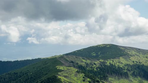 Dramatic Summer Clouds and Green Mountains