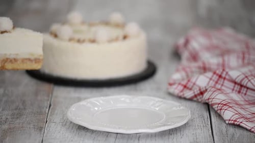 Cutting a Delicious Cake Slice on Plate
