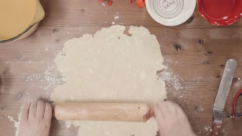 Step by step. Rolling out dough for pie crust.