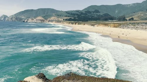 View From the Cliff on a Large Sandy Beach of the Pacific Ocean in California