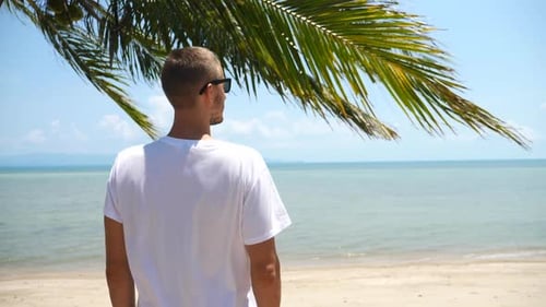 Man Looking At The Sea On Summer Beach Vacation