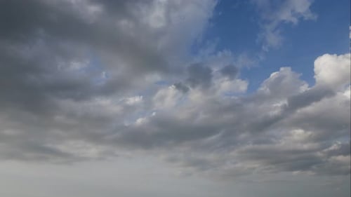 Time lapse of white cloud moving pass around sky background