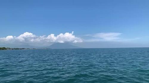 Turquoise Ocean Waters Meet the Distant Coastline