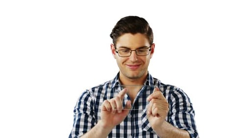 Smiling man using futuristic digital tablet