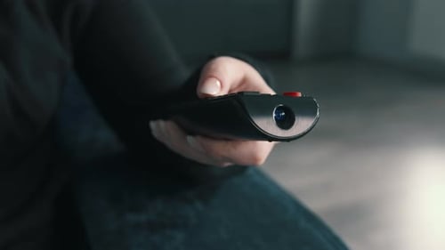 Close Up of Woman Hand Switches Channels Watch Tv at Home Cinematic