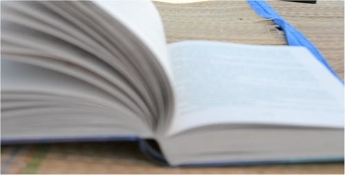 Pages Turning in Open Book Close Up