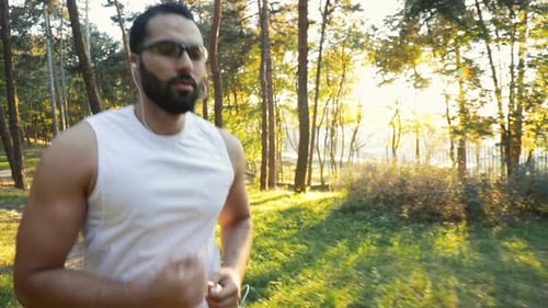 Man Goes Jogging in Park
