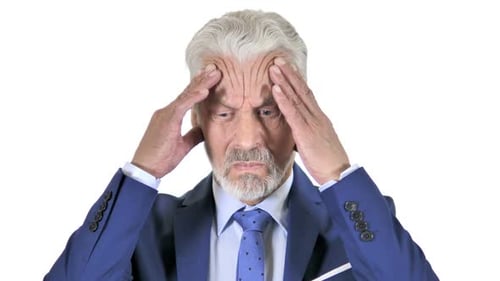 Man Massaging Temples to Relieve Headache Pain