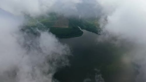 Flying through the cloud. Aerial view of view of blue sky and white clouds