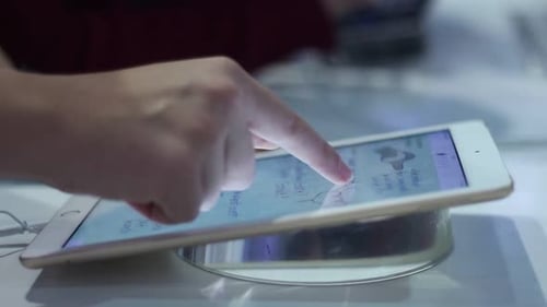 Young Girl Uses A Modern Tablet Gadget