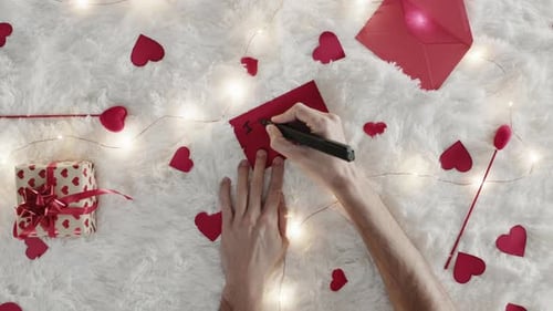 Romantic Man Writes I Love You Note