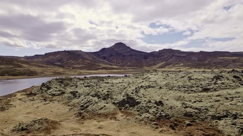 Aerial Panorama View of Beautiful Mountain Range and a Calm Lake Waters