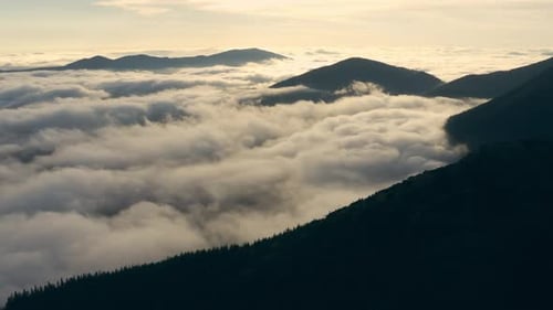 Mountains and Cloudscape at Sunrise Aerial View