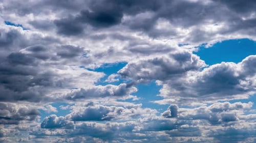 Dramatic Clouds Time-Lapse over a Sunny Blue Sky