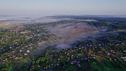 Aerial View of Rural Town with Morning Mist