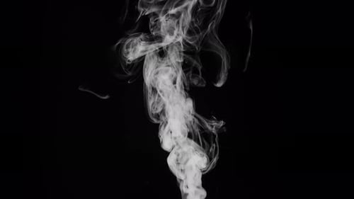 Abstract Smoke Swirls Against Black Background