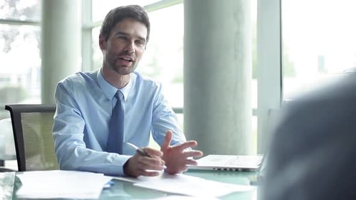Businessman conducting interview in office