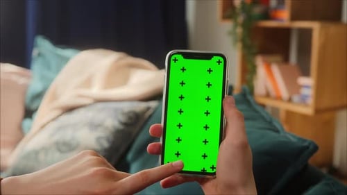 Closeup of Smartphone with Green Screen Young Man Hands Holding Mobile Phone Isolate Display Touch