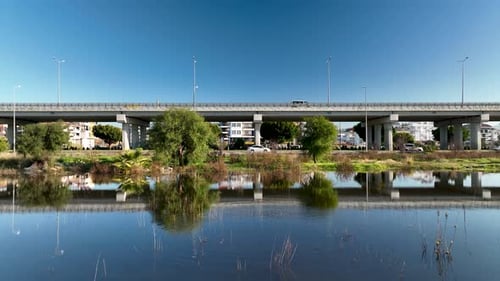 Traffic in the reflection of water aerial view 4 K