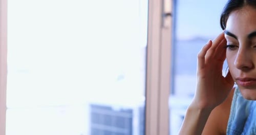Female executive suffering form headache