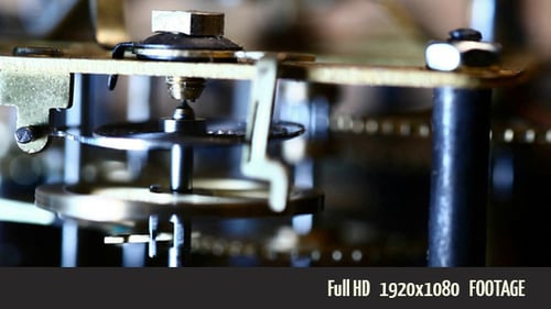 Intricate Clockwork Gears Turning in Close-Up