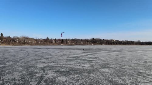wind surfing over a frozen lake, winter sports in Minnesota, explore only in MN, meet minneapolis ms