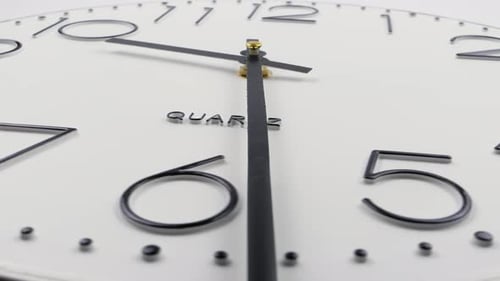 Clock Hands Moving on White Quartz Clock Face