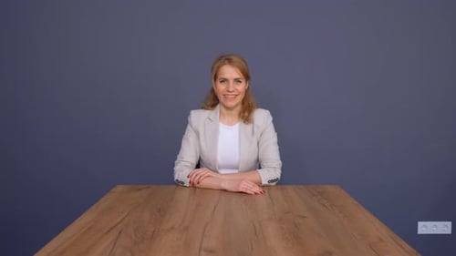 Happy Mature Businesswoman in Office