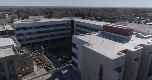 West Denver urban development apartments showing raised community garden. 4k drone high bit rate 202