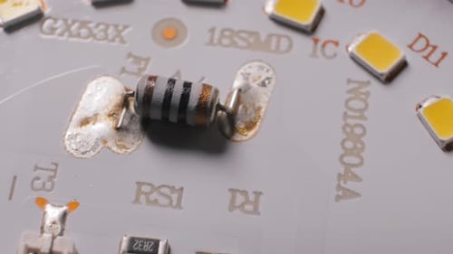 White Circuit Board with Electronic Components Macro View