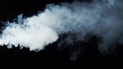 Wispy White Smoke Flowing on Black Background