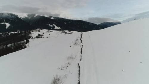 Small Village in the Winter Mountains. Taken with Drone Camera.