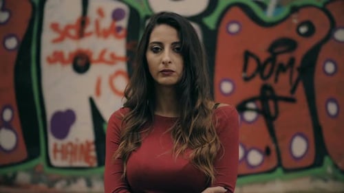 Thoughtful sad attractive woman thinking alone- urban background