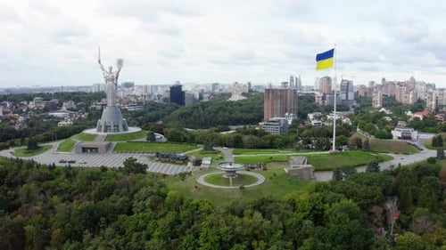 Kyiv's Motherland Monument and Ukrainian Flag Aerial View