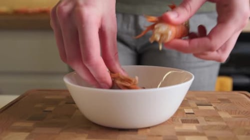 Preparing fresh shrimp, close up in kitchen