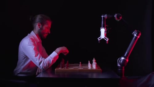 Man Plays Chess Against a Robotic Arm