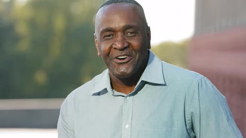 Smiling Man Talking Outdoors Close Up Shot