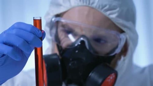 Expert Examining Flask With Toxicological Substance, Disease Control Center