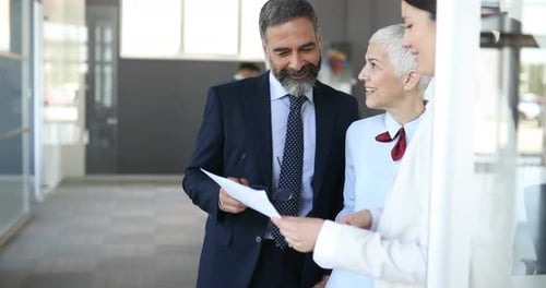 Happy Business Colleagues in Office Working Together