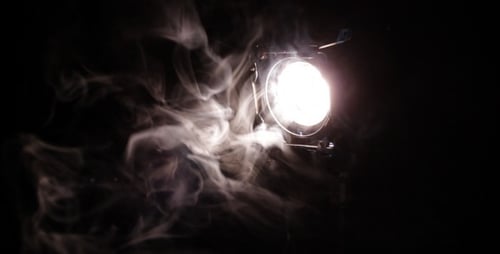Dramatic Studio Spotlight with Billowing Smoke Effects